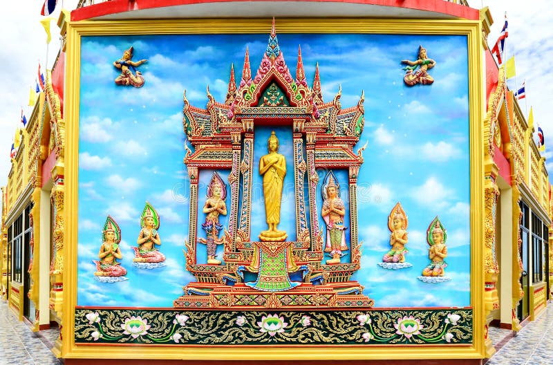 Mural and sculpture thai style on the wall of buddhist temp