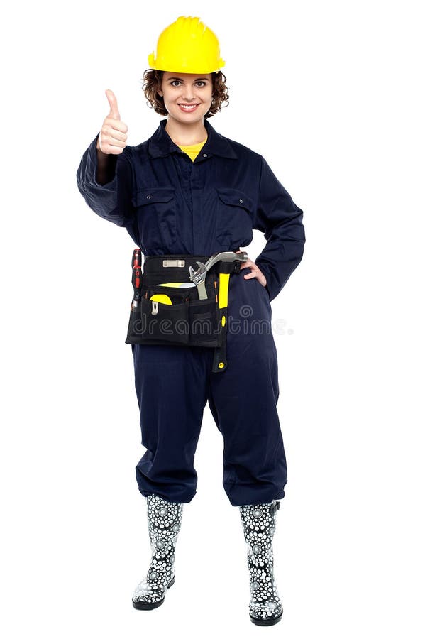 Muratore grazioso che gesturing successo immagini stock Muratore grazioso che gesturing successo immagini stock