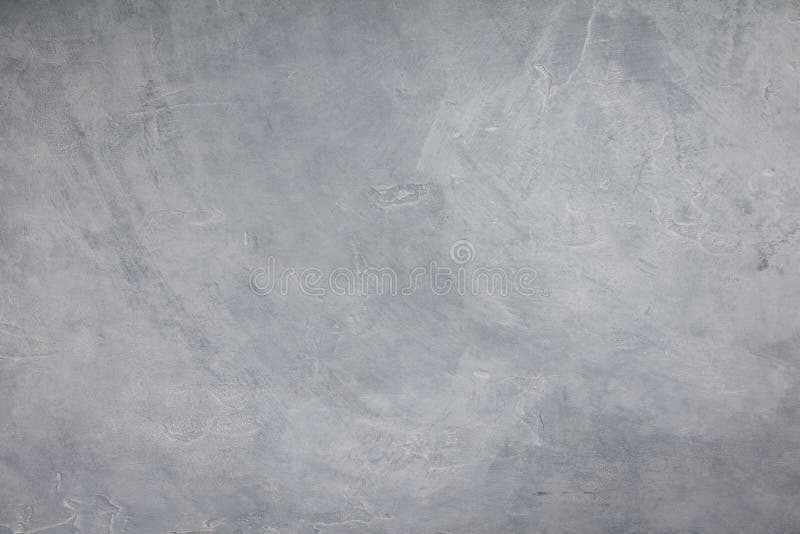 Muro de cemento del color gris claro, fondo de la textura del cemento