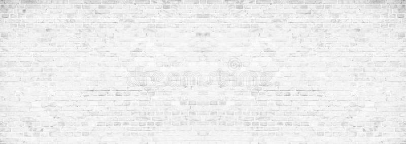 Muro di mattoni bianco grungy semplice con il fondo grigio chiaro di struttura della superficie del modello delle tonalità nell'a fotografie stock libere da diritti
