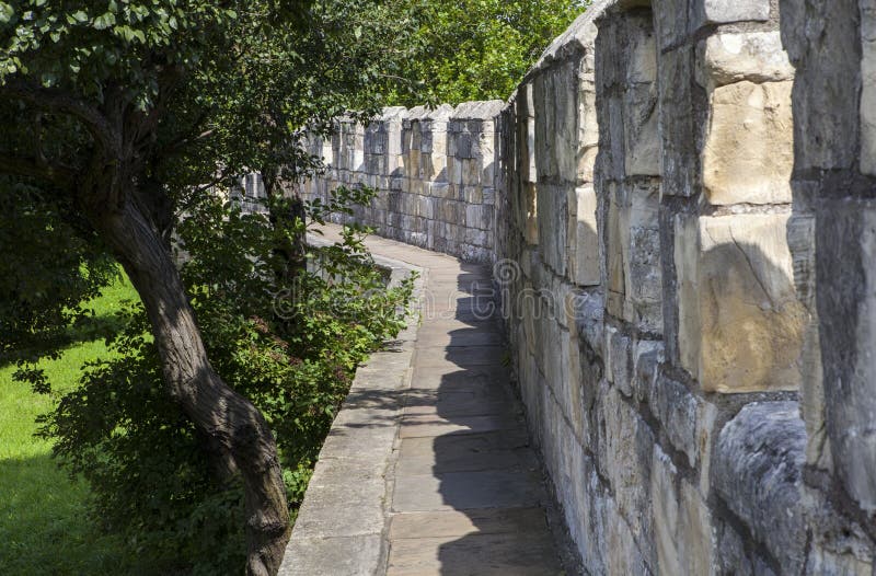 The historic York City Walls in York, England. Since Roman times, the city of York has been defended by walls and substantial portions of these still remain today. The historic York City Walls in York, England. Since Roman times, the city of York has been defended by walls and substantial portions of these still remain today.