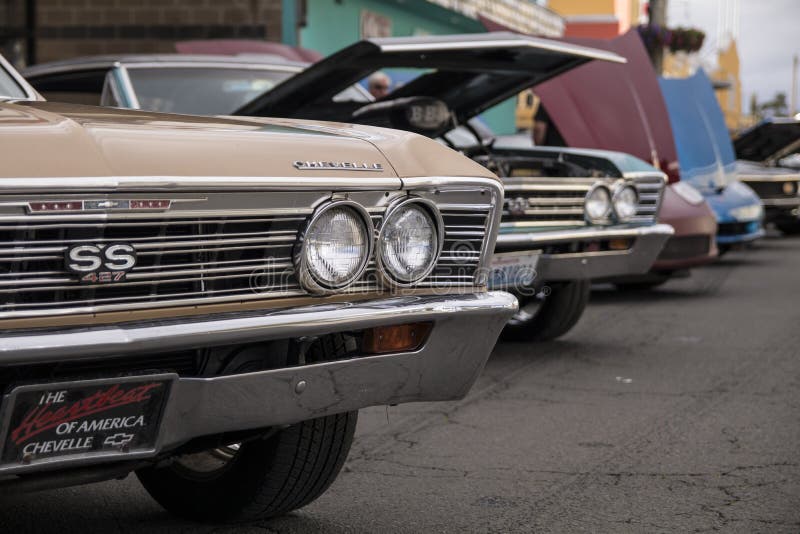 SEASIDE, OR/USA - JUNE 16, 2017 - Classic cars line up along N Columbia Street for the Muscle and Chrome Classic Car Show on Father`s Day weekend. SEASIDE, OR/USA - JUNE 16, 2017 - Classic cars line up along N Columbia Street for the Muscle and Chrome Classic Car Show on Father`s Day weekend.