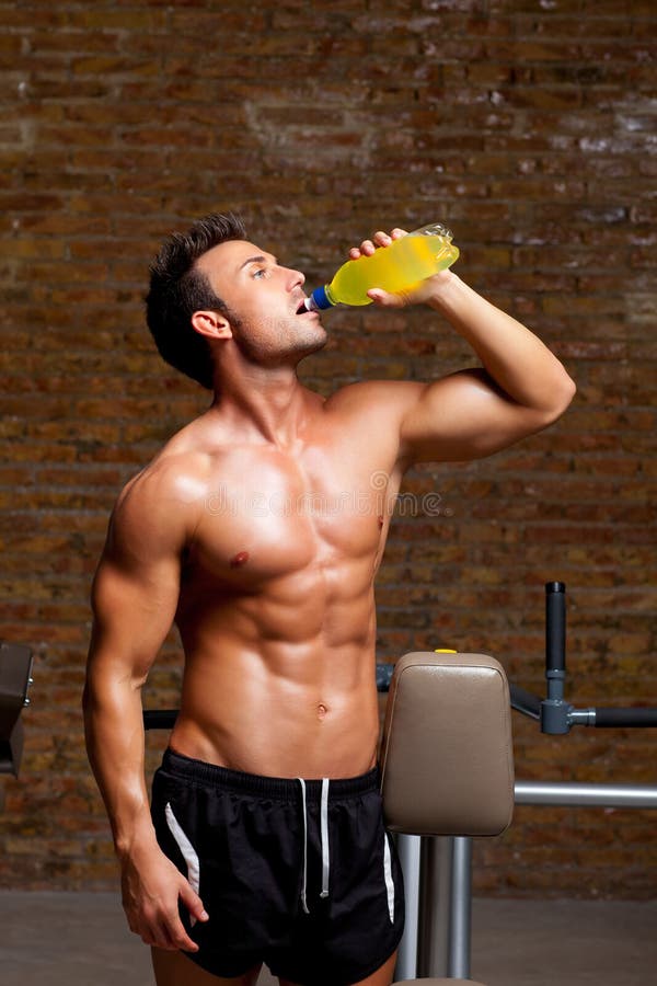 Muscle Man at Gym Relaxed with Energy Drink Stock Image Image of