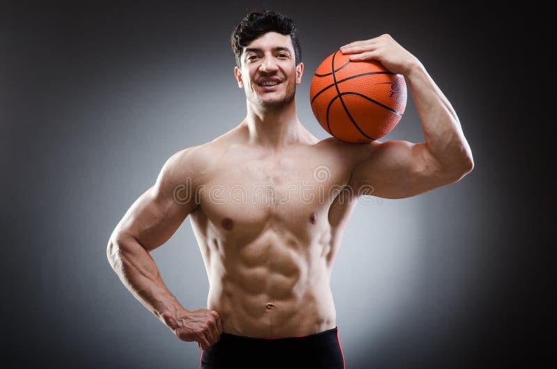 Muscular Basketball Player with Ball Shows Skill Stock Photo Image of