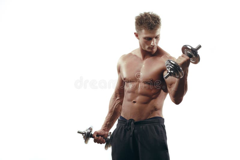 Muscular bodybuilder man doing exercises with dumbbells isolated over white background