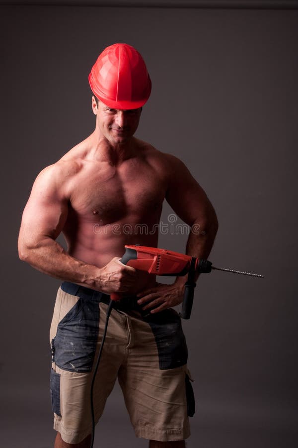 Muscular construction worker stock image Muscular construction worker stock image