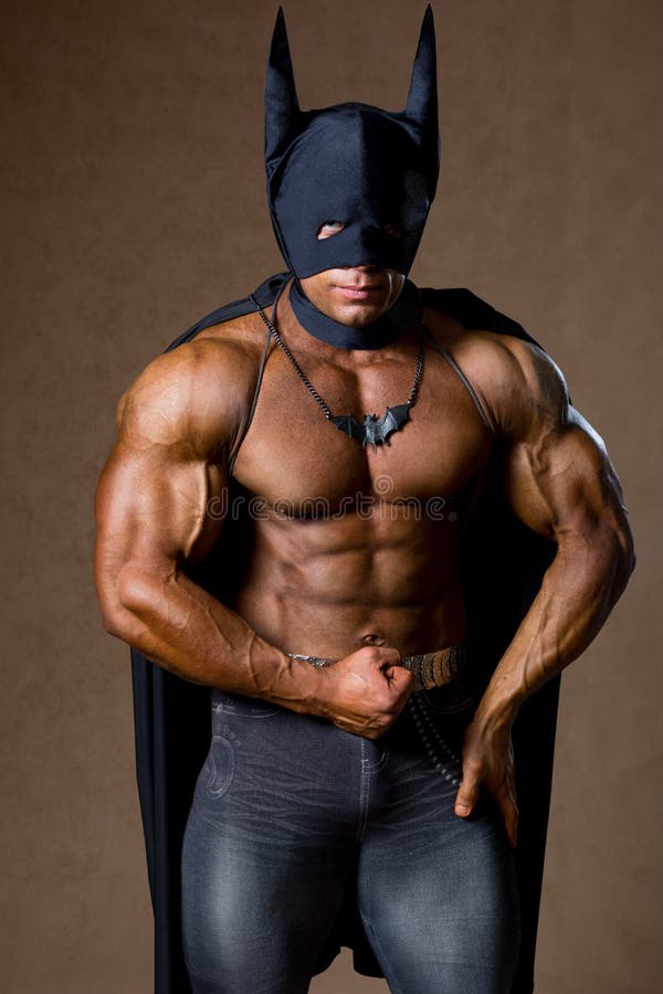 A Muscular Man in a Batman Costume. Stock Photo - Image of hero, emblem:  35179984