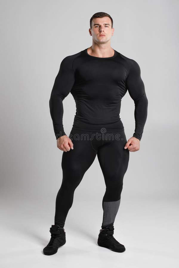 Muscular Man in Black Compression Sportswear on Gray Background Stock Image  - Image of active, athletic: 198067309