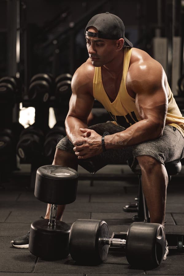 Muscular Man with Dumbbells Working Out in Gym, Strong Arab Bodybuilder ...