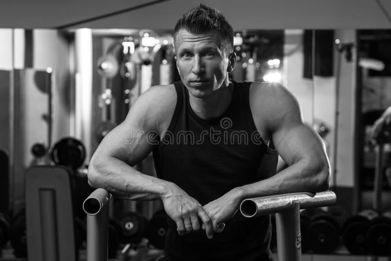 Muscular Man during Workout in the Gym Stock Image - Image of ripped ...