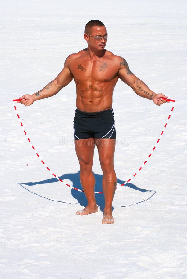 Muscular Man with Jump Rope on the Beach Stock Photo Image of male, arms 22188378