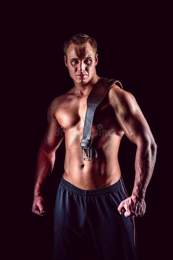 Strong Muscular Man Lifting Belt Posing Dark Stock Photos Free