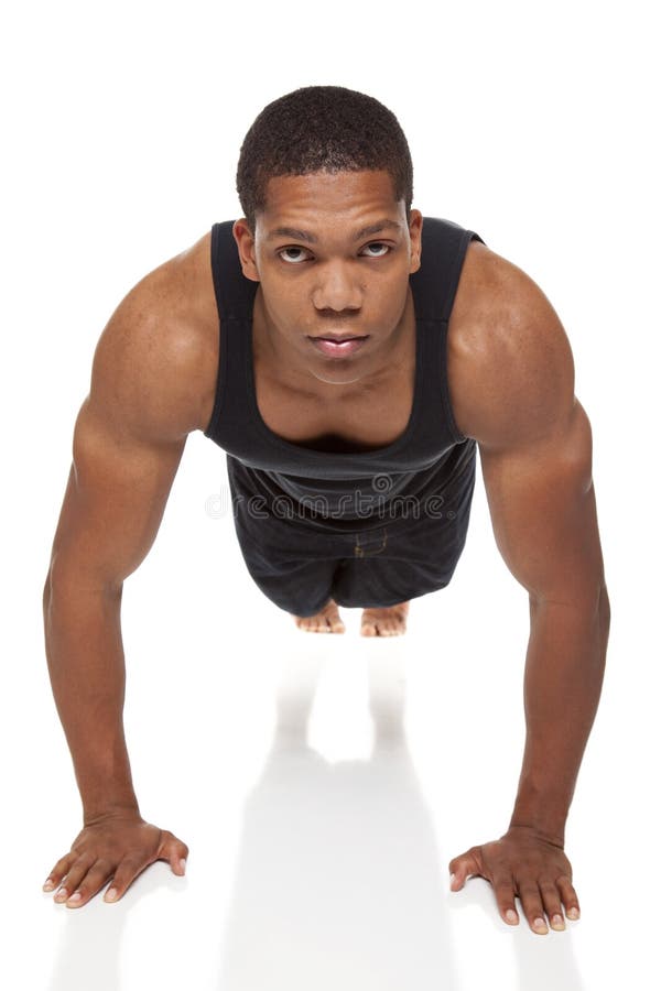 Muscular man pushups stock photography