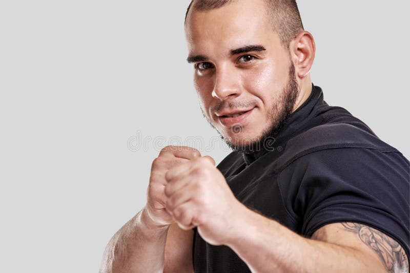 Muscular powerful kick-boxer royalty free stock image