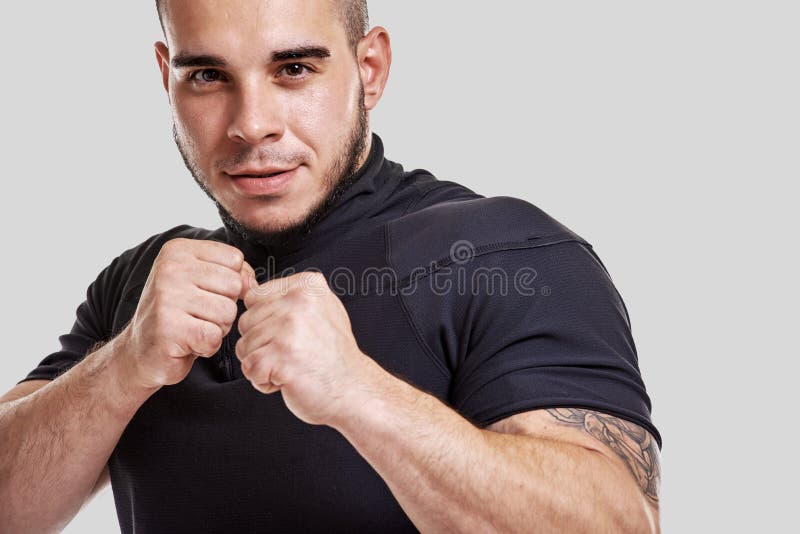 Muscular powerful kick-boxer royalty free stock photography