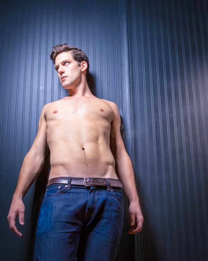 Slender Male Washboard Abs stock photo. Image of expression 48179850