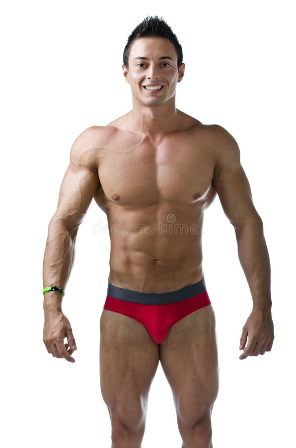 Muscular Young Bodybuilder In Relaxed Pose Smiling Stock Photo - Download  Image Now - iStock