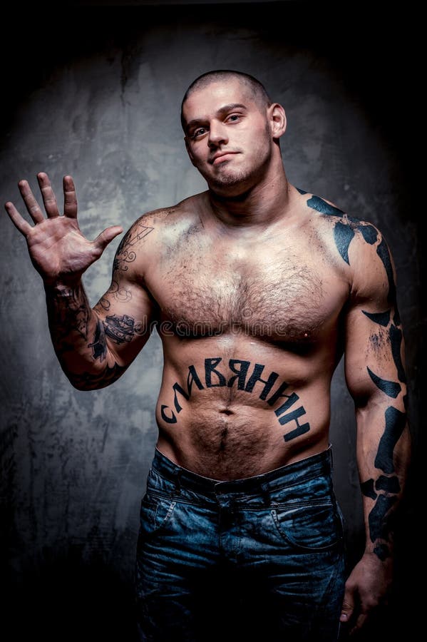 Muscular Young Man with Many Tattoos Stock Image - Image of adult, jeans: 27659573 Muscular Young Man with Many Tattoos Stock Image - Image of adult, jeans: 27659573