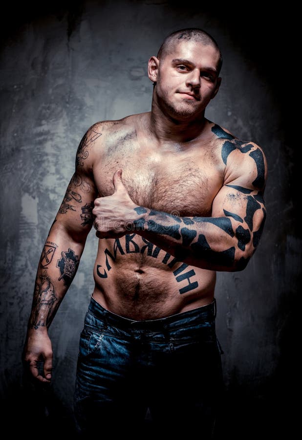 Muscular Young Man with Many Tattoos Stock Photo - Image of human,  caucasian: 27659576