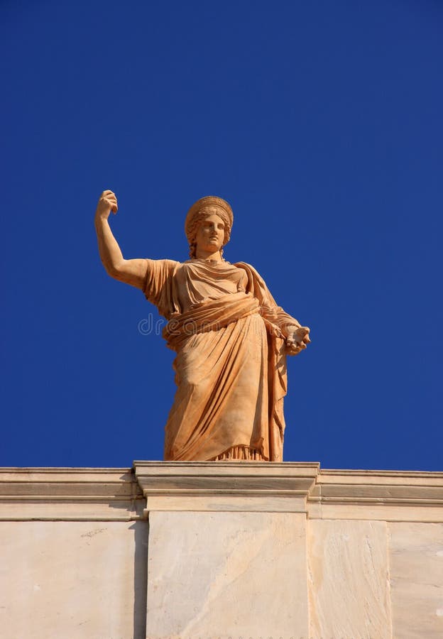 Greece Athens Archaeological Museum - statue of a female figure on the roof-top. Greece Athens Archaeological Museum - statue of a female figure on the roof-top