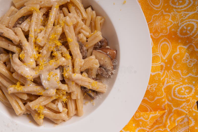 Mushroom pasta with lemon stock image. Image of food 214187033