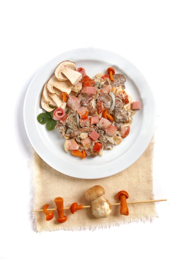Mushroom salad with white mushrooms, honey agaric, bacon, served with parmesan cheese on white plate. close up stock photos Mushroom salad with white mushrooms, honey agaric, bacon, served with parmesan cheese on white plate. close up stock photos