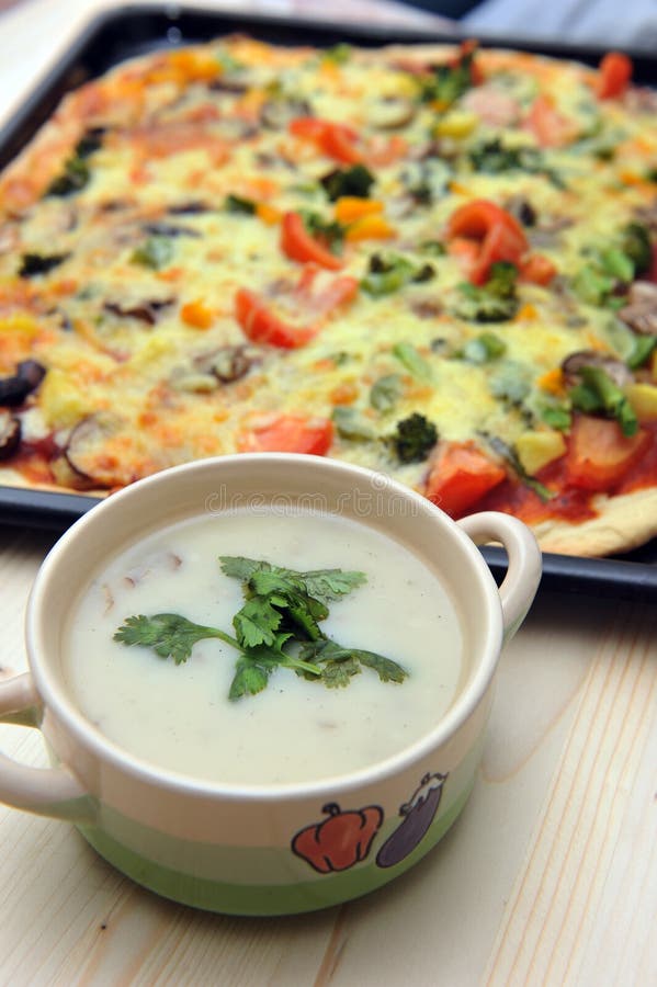 Mushroom soup and pizza