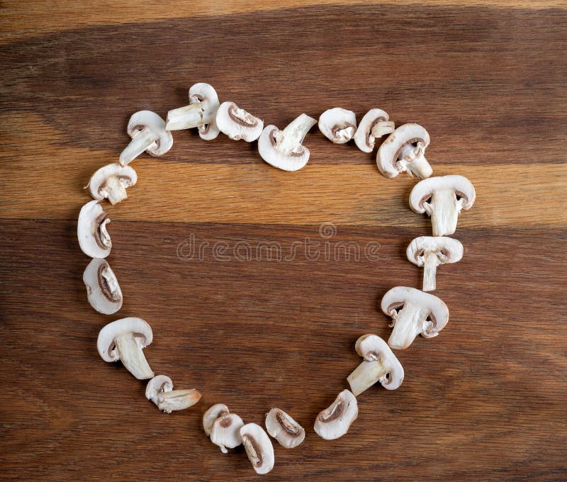 Mushrooms in the Shape of a Heart Health and Wellness Stock Image