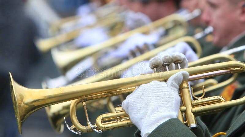 Hands of musicians with trumpets (selective focus). Hands of musicians with trumpets (selective focus)