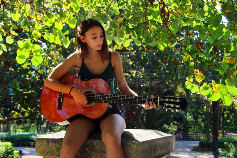 Concert ISEO- A Spanish girl Album Last Night in acoustic playing in Corte  Ingles in Madrid - Spain. Only guitar Stock Photo - Alamy