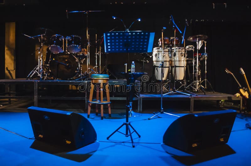 Music studio full of instruments and pc display Stock Photo - Alamy