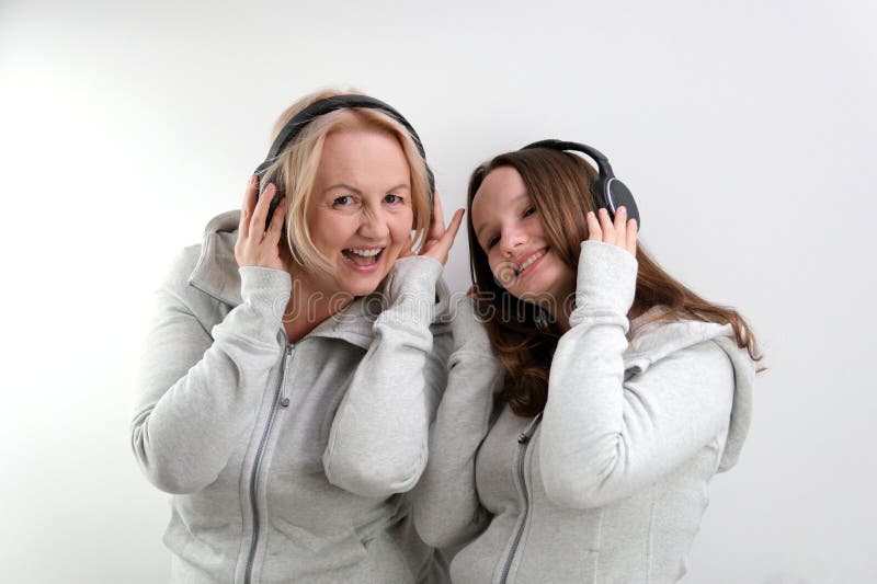 music and technology concept two girls stock images