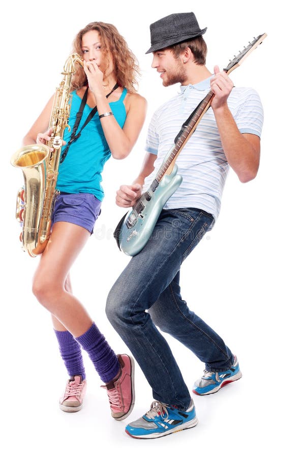 Shot of a musical band playing their instruments with great emotions. Shot of a musical band playing their instruments with great emotions.