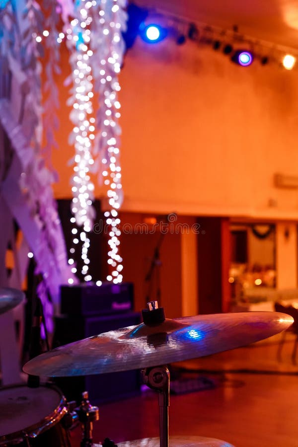 Musical Drum Kit and Microphones in the Concert Hall on Stage Stock