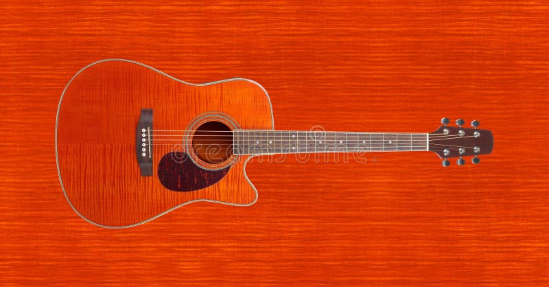 Musical instrument - Orange Flame maple cutaway acoustic guitar royalty free stock photos