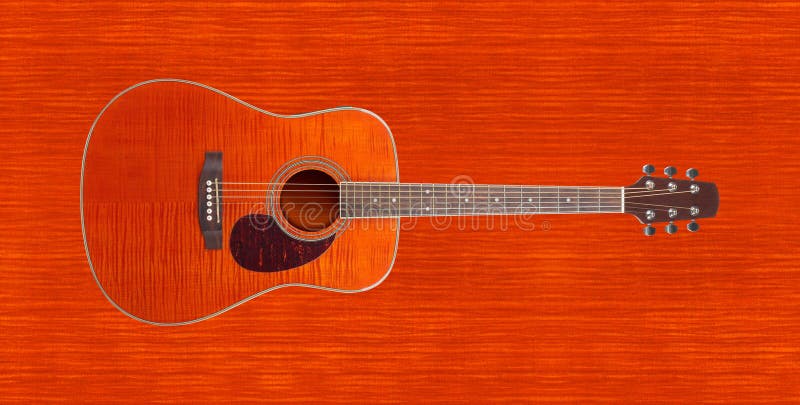 Musical instrument - Orange Flame maple western acoustic guitar royalty free stock image