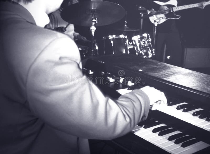 Musician playing hammond organ stock image Musician playing hammond organ stock image