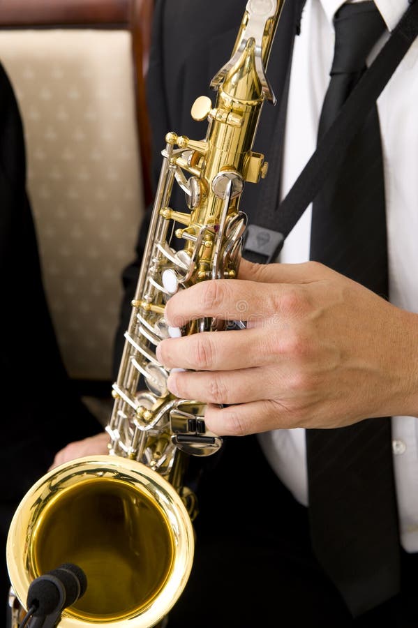 Musician playing an instrument stock photography