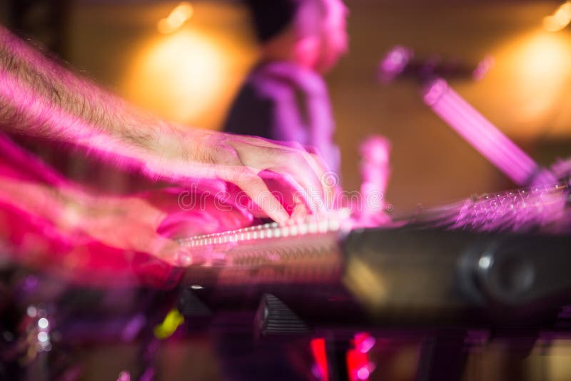 Musician Plays Keyboards in a Rock Band Stock Photo - Image of electric
