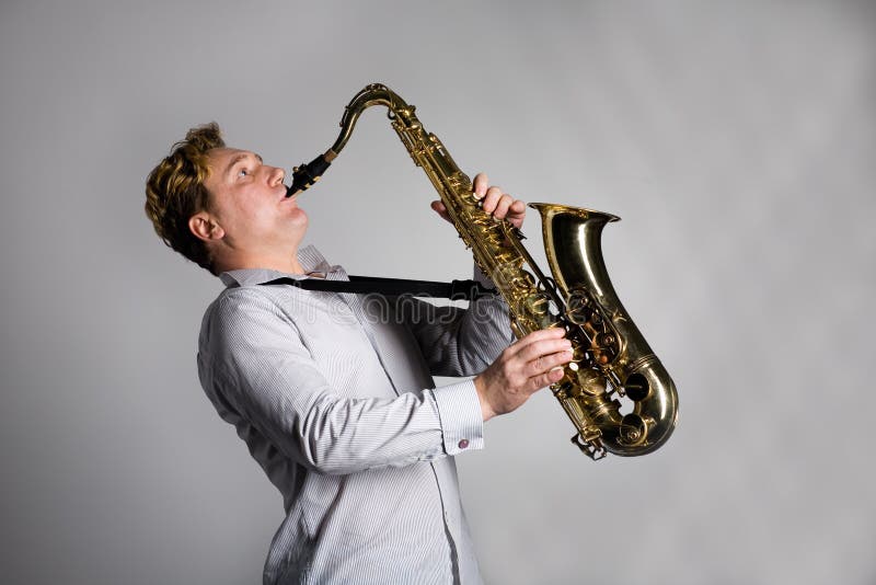 Musician Plays the Saxophone. Stock Photo Image of instrumant, male