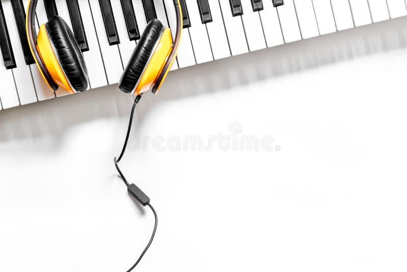 Musician work set with synthesizer and headphones white table background top view space for text royalty free stock photos Musician work set with synthesizer and headphones white table background top view space for text royalty free stock photos