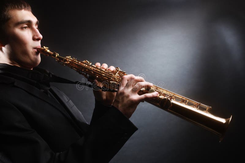 Saxophone Saxophonist Jazz musician with soprano sax Classical musical instruments. Saxophone Saxophonist Jazz musician with soprano sax Classical musical instruments