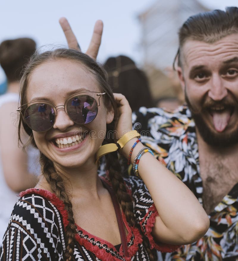 People Enjoying Music Concert Festival Together. People Enjoying Music Concert Festival Together