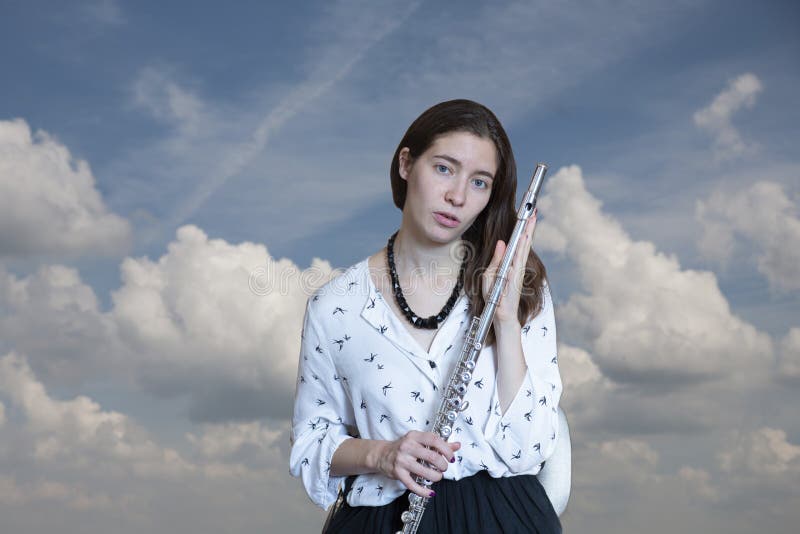 Musikerflöjtisten Girl Flute Player arkivfoton Musikerflöjtisten Girl Flute Player arkivfoton