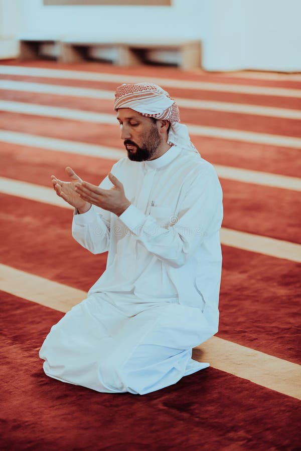 Muslim Arabic Man Praying. Religious Muslim Man Praying Inside the