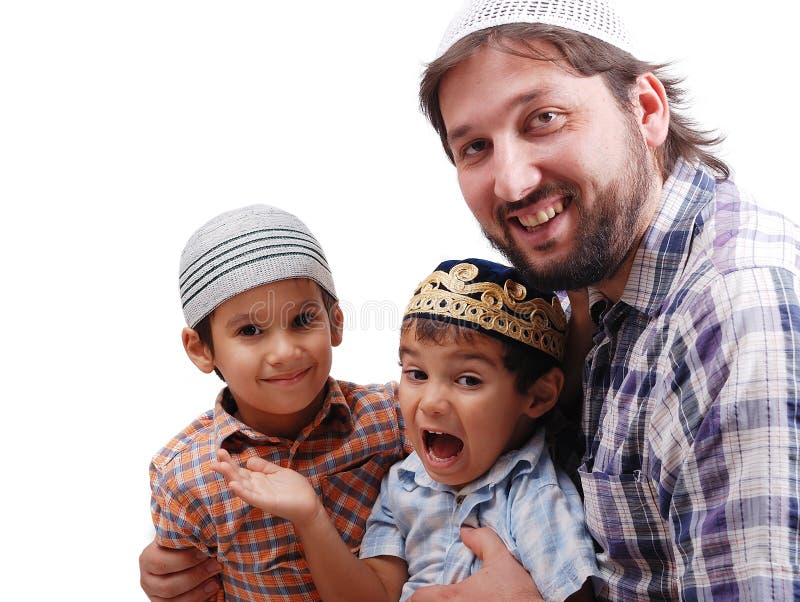 Muslim family father and two boys smiling