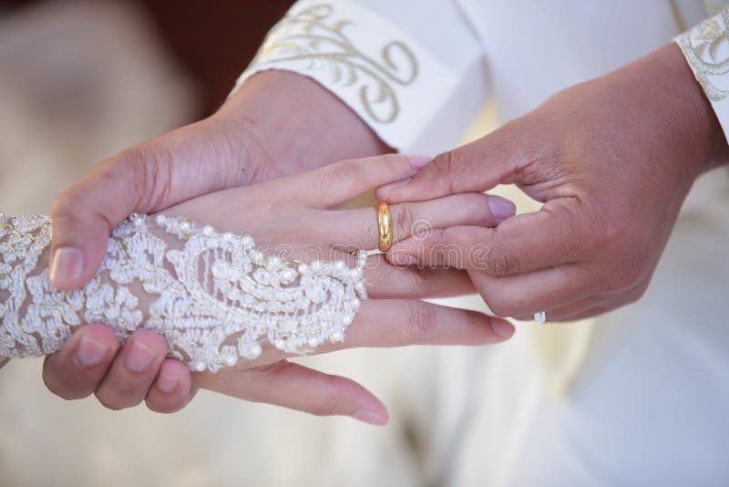 Muslim Groom Wears the Ring Bride Stock Photo Image of couple, adult 103647076