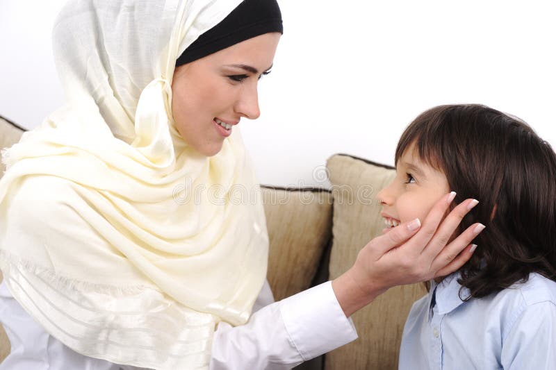 Muslim mother and son relaxing