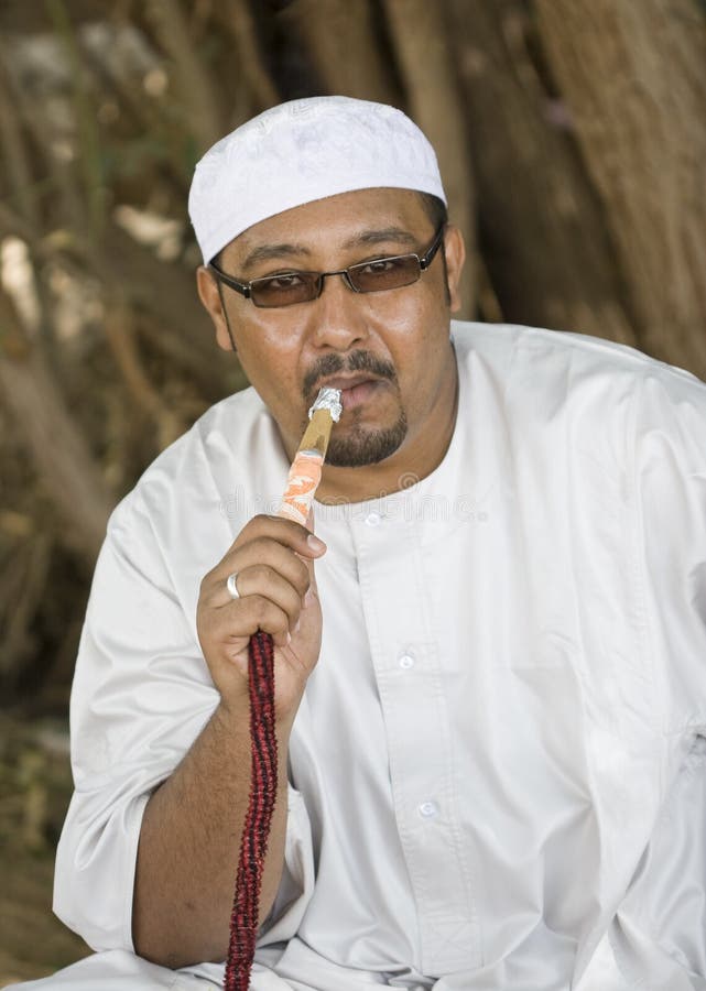 Muslim smoking hookah stock image. Image of muslim, arab 13314067