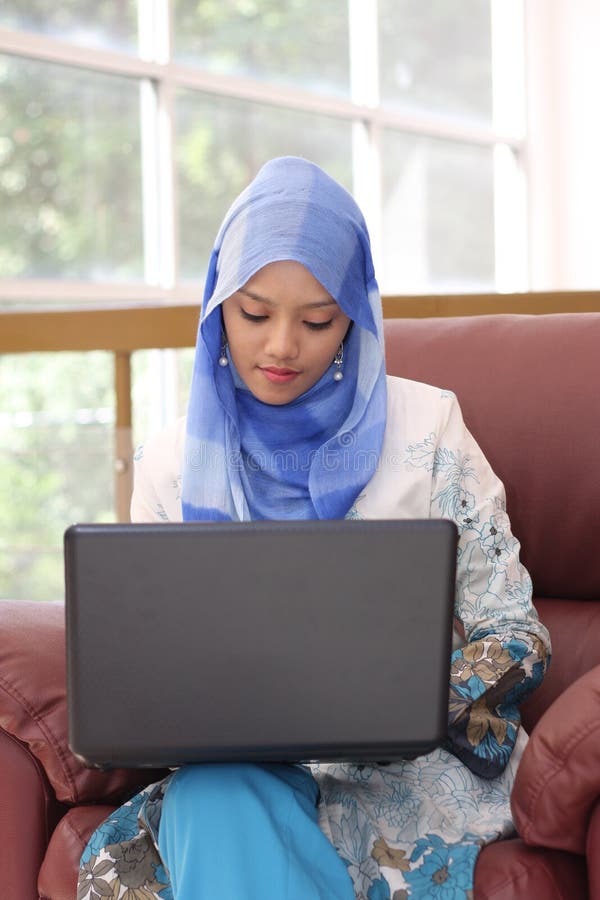 Muslim woman with laptop